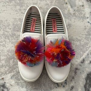 Betsey Johnson Trixy White Slip-On Shoes with Colorful Pom Poms